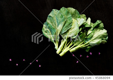 Chinese kale vegetable on  back wood background. 45868094