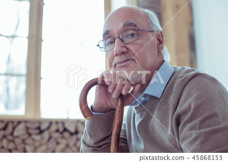 Portrait of attentive bearded pensioner that looking at camera 45868153