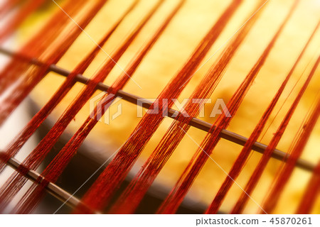 Silk thread line from hand weave loom. 45870261