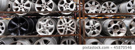 Auto parts market. Car wheels are on the ground. 45870546