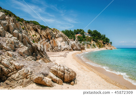 Wild beach in Vourvourou, Sithonia, Greece Wild beach in Vourvourou, Sithonia, Greece 45872309