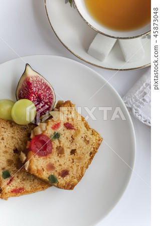 Cake and fresh fruits for tea time 45873048