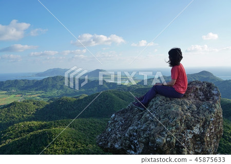 Ishigakijima Nozomi view from the top of the Mape and climbers Ishigakijima Nozomi view from the top of the Mape and climbers 45875633