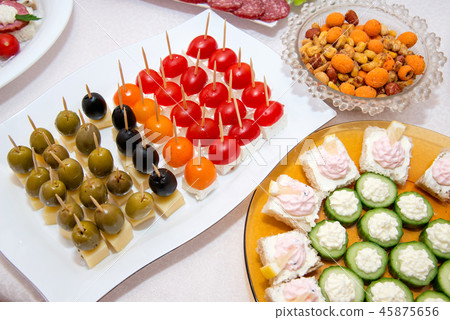 Close up of small canapes arranged on a plate Close up of small canapes arranged on a plate 45875656