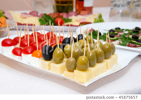 Close up of small canapes arranged on a plate Close up of small canapes arranged on a plate 45875657