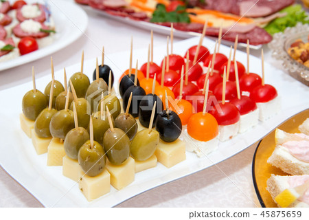 Close up of small canapes arranged on a plate Close up of small canapes arranged on a plate 45875659