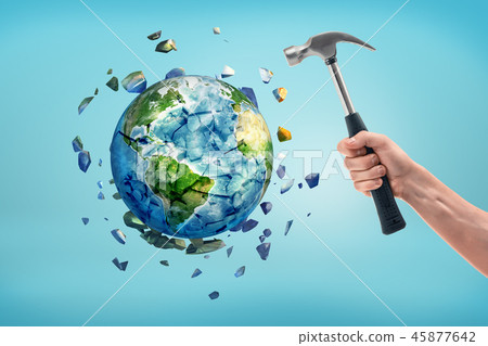 The earth is shattered after being hit by a hammer. The earth is shattered after being hit by a hammer. 45877642