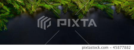 Christmas and Happy New Year holiday background with natural fir spruce, on black background 45877882