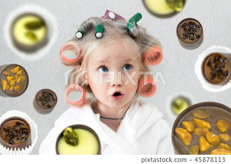 The girl dreams of sweet candy. 45878113