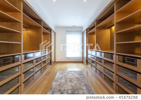 Modern closet in the hotel for different needs and clothes. Modern closet in the hotel for different needs and clothes. 45878298