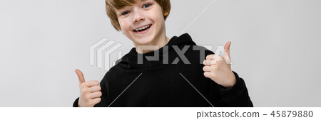 Teenage boy in fashionable clothes Teenage boy in fashionable clothes 45879880