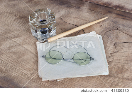Old fountain pen and inkwell with old letters Old fountain pen and inkwell with old letters 45880380
