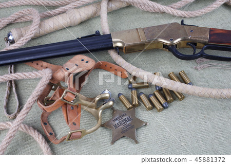 Wild west rifle with ammunition and sheriff badge 45881372