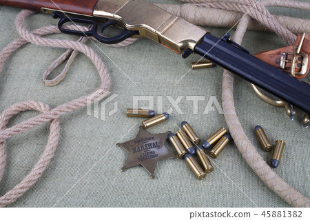 Wild west rifle with ammunition and sheriff badge 45881382
