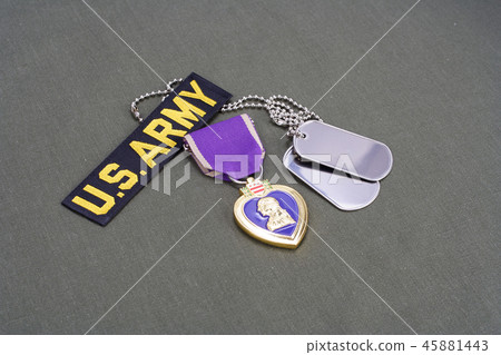 Purple Heart award on US ARMY olive green uniform 45881443