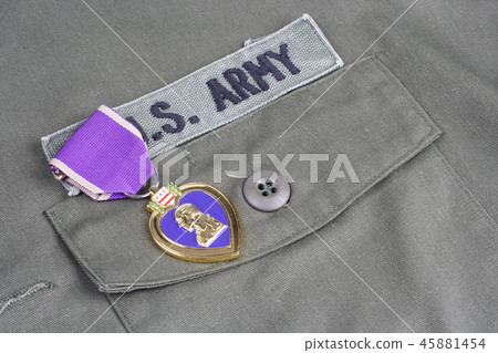 Purple Heart award on US ARMY green uniform 45881454