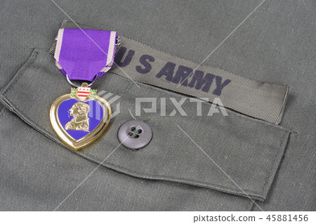 Purple Heart award on US ARMY olive green uniform 45881456