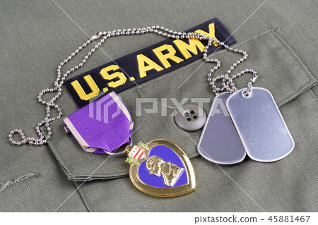 Purple Heart award on US ARMY olive green uniform 45881467