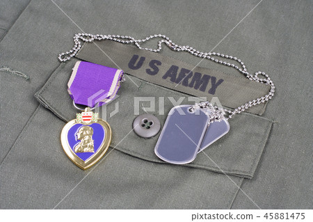 Purple Heart award on US ARMY olive green uniform 45881475
