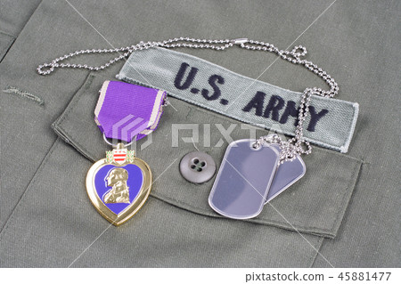 Purple Heart award on US ARMY olive green uniform Purple Heart award on US ARMY olive green uniform 45881477
