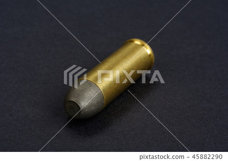 The .45 caliber revolver cartridges on black  45882290