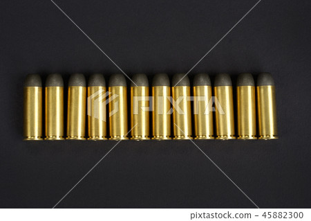 The .45 caliber revolver cartridges on black  45882300