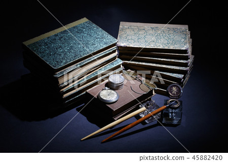 old books, papers, ink pen and inkpot old books, papers, ink pen and inkpot 45882420