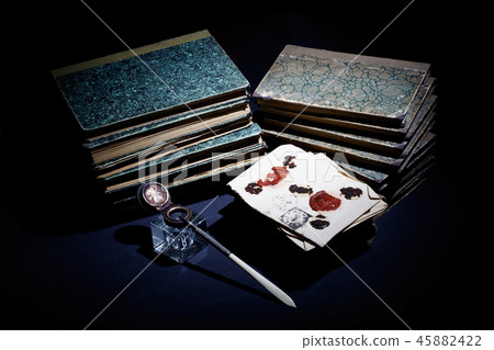 old books, papers, ink pen and inkpot old books, papers, ink pen and inkpot 45882422