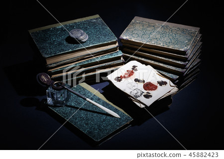 old books, papers, ink pen and inkpot old books, papers, ink pen and inkpot 45882423