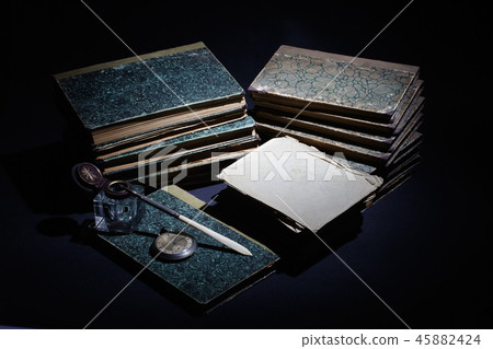old books, papers, ink pen and inkpot old books, papers, ink pen and inkpot 45882424
