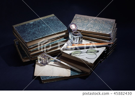 old books, papers, ink pen and inkpot old books, papers, ink pen and inkpot 45882430
