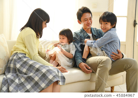 Living room sofa parent and child 4 people 45884967