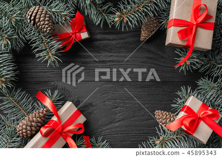 Christmas card with gifts and fir branches Christmas card with gifts and fir branches 45895343