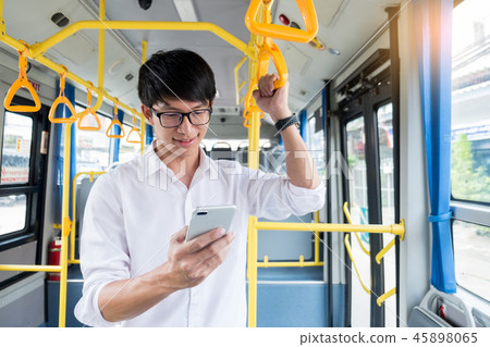 Passenger transport. people in the bus. man rides a bus, listeni Passenger transport. people in the bus. man rides a bus, listeni 45898065