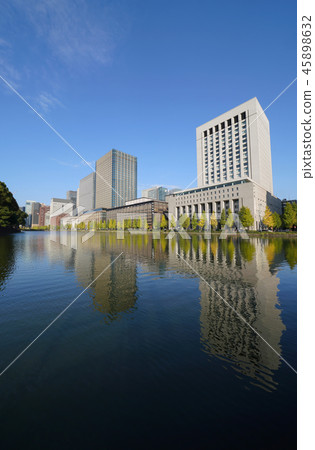 Tokyo cityscape in Japan You can see the skyscrapers of the business area in front of the Imperial Palace. 45898632