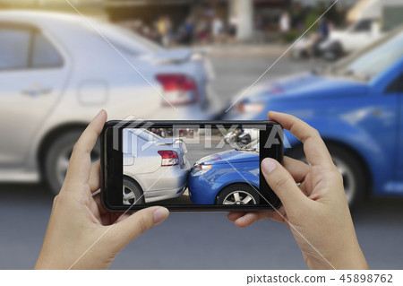 Close up hand holding smartphone and take photo 45898762