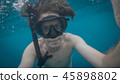 A young caucasian snorkeling man underwater selfie. 45898802