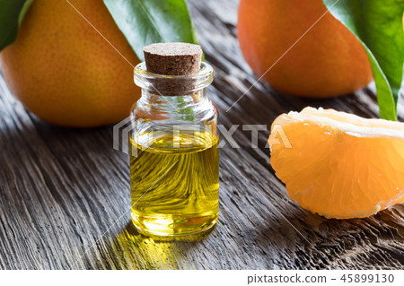 A bottle of tangerine essential oil 45899130