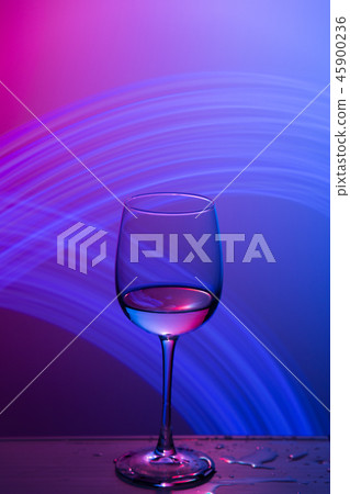 Wine Glass with freeze light on background. 45900236