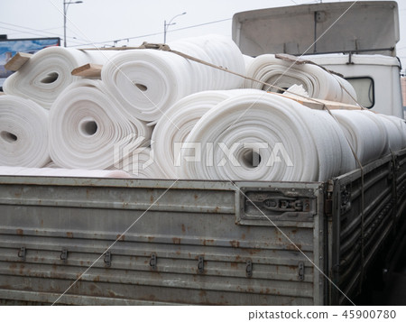 truck full of compressed white mineral wool 45900780