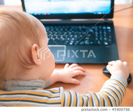 little child learning alphabet on laptop computer little child learning alphabet on laptop computer 45900786
