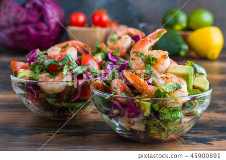 Mexican salad with fried shrimps, fresh avocado Mexican salad with fried shrimps, fresh avocado 45900891