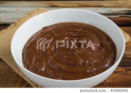 Chocolate smooth whisked dough in a white bowl 45900946