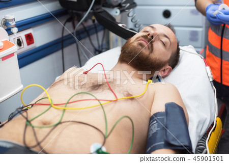 ecg electrodes on patient chest in ambulance ecg electrodes on patient chest in ambulance 45901501