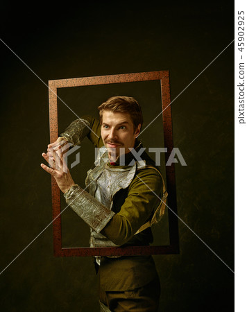 Medieval knight on dark background. 45902925