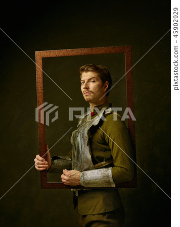 Medieval knight on dark background. 45902929