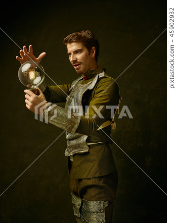 Medieval knight on dark background. 45902932