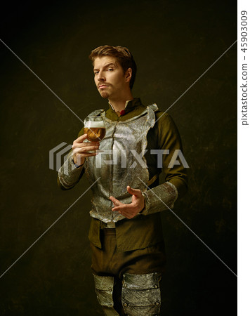 Medieval knight on dark background. 45903009