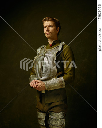 Medieval knight on dark background. 45903016