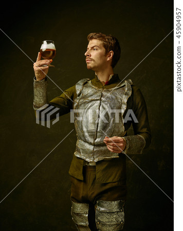 Medieval knight on dark background. Medieval knight on dark background. 45904957